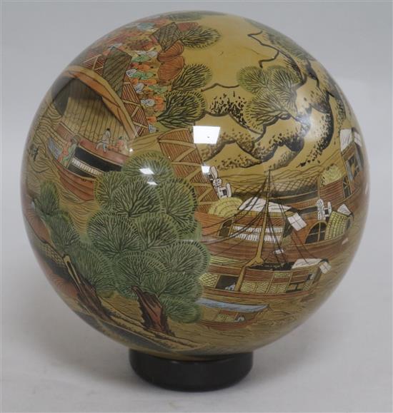 A large Chinese inside-painted glass globe, stand